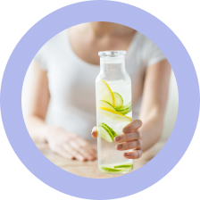 Woman Holding Jug Of Infused Water